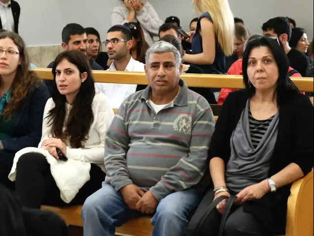 אילנה ושמואל ראדה הוריה של תאיר ראדה בבית המשפט המחוזי, נצרת. פברואר 2014 (ערן גילווארג)