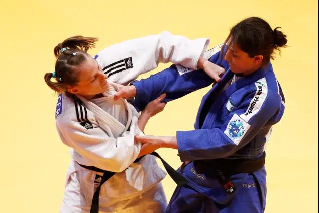 ירדן ג'רבי (מימין) מול אליס שלזינגר (GettyImages , Dean Mouhtaropoulos)