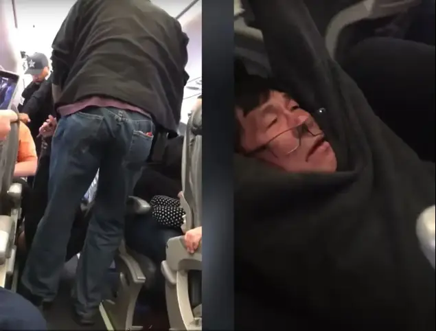 שוטרים מפנים נוסע של יונייטד מטיסה (צילום מסך)