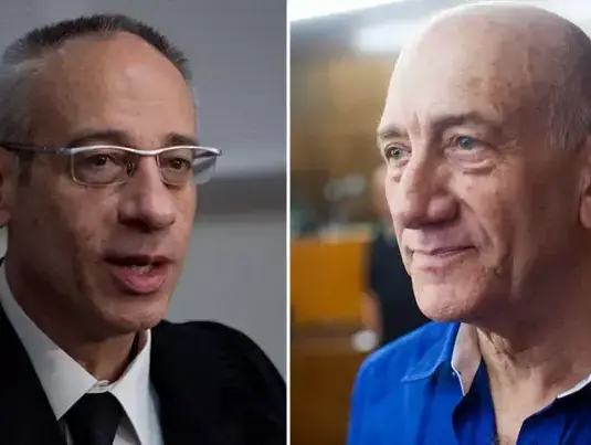 אהוד אולמרט ועורך דין ונבות תל צור. מאי 2014 (עיבוד תמונה , דרור עינב, יותם רונן) אהוד אולמרט ועורך דין ונבות תל צור. מאי 2014 (עיבוד תמונה , דרור עינב, יותם רונן)