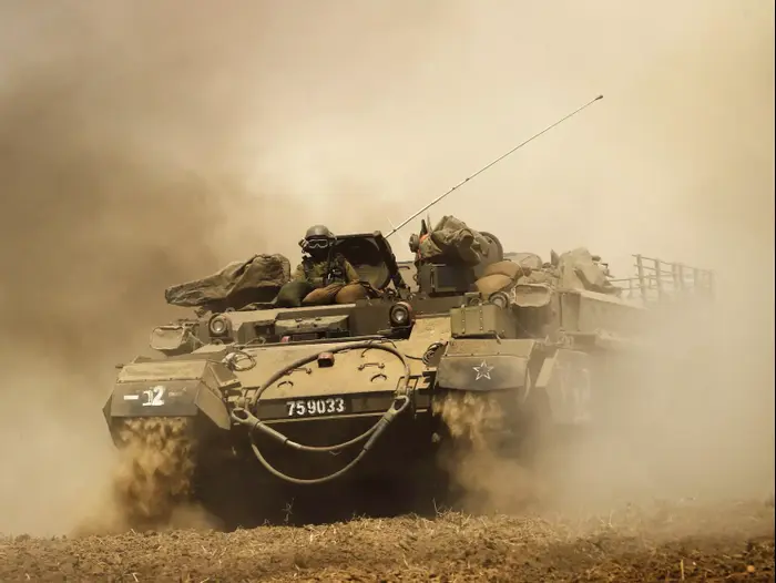 חיילי צה"ל בגבול רצועת עזה במסגרת מבצע צוק איתן 12 ביולי 2014 (רויטרס) חיילי צה"ל בגבול רצועת עזה במסגרת מבצע צוק איתן 12 ביולי 2014 (רויטרס)