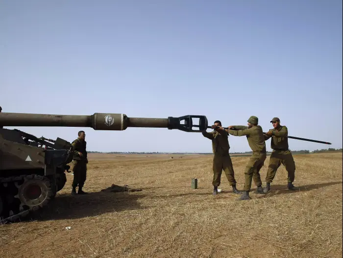 חיילי צה"ל בגבול רצועת עזה במסגרת מבצע צוק איתן 12 ביולי 2014 (רויטרס) חיילי צה"ל בגבול רצועת עזה במסגרת מבצע צוק איתן 12 ביולי 2014 (רויטרס)