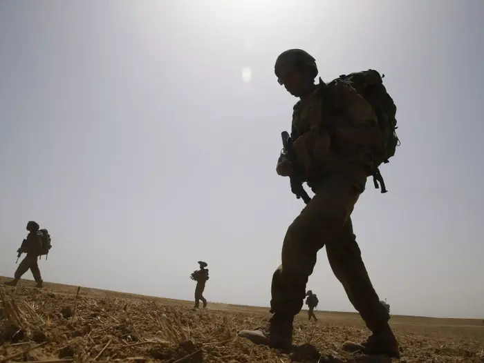 חיילי צה"ל בגבול רצועת עזה במסגרת מבצע צוק איתן 12 ביולי 2014 (רויטרס) חיילי צה"ל בגבול רצועת עזה במסגרת מבצע צוק איתן 12 ביולי 2014 (רויטרס)