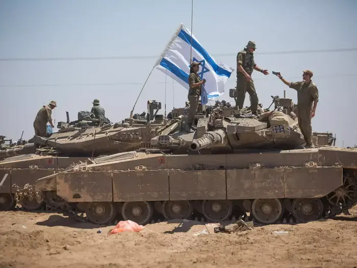 כוחות צה"ל הבוקר בגבול רצועת עזה, יולי 2014 (יותם רונן) כוחות צה"ל הבוקר בגבול רצועת עזה, יולי 2014 (יותם רונן)