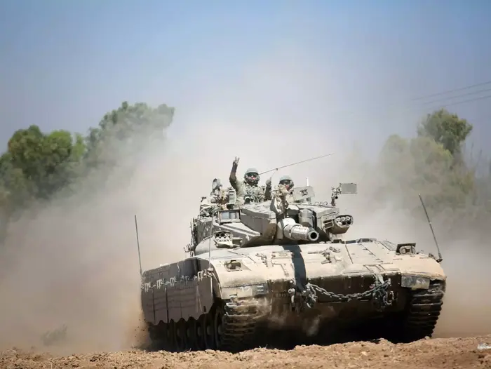 כוחות צה"ל נכנסים לדרום רצועת עזה במהלך מבצע צוק איתך, אוגוסט 2014 (נועם מושקוביץ) כוחות צה"ל נכנסים לדרום רצועת עזה במהלך מבצע צוק איתך, אוגוסט 2014 (נועם מושקוביץ)