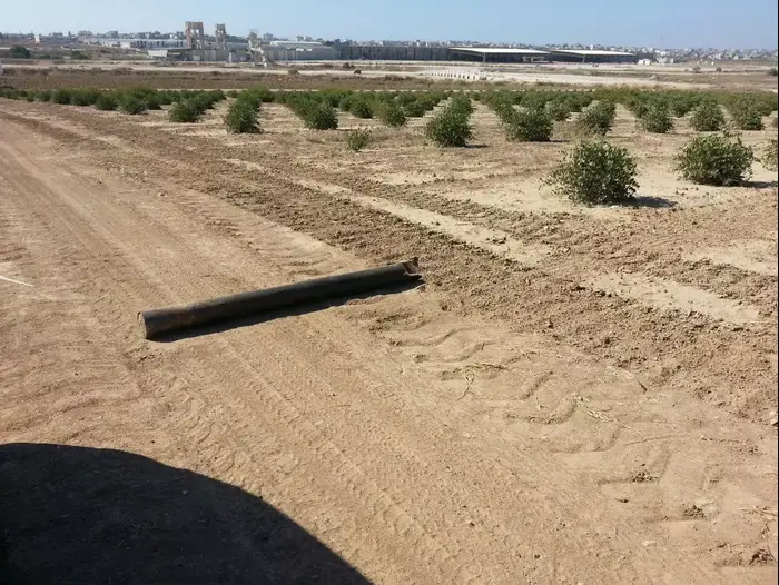 שרידי רקטה בשדות נחל עוז על רקע שכונת שג'אעיה (מערכת וואלה! NEWS) שרידי רקטה בשדות נחל עוז על רקע שכונת שג'אעיה (מערכת וואלה! NEWS)