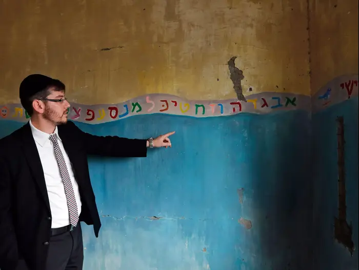 חנוכת בית חב"ד המחודש מומבאי, 26 באוגוסט 2014 (AP) חנוכת בית חב"ד המחודש מומבאי, 26 באוגוסט 2014 (AP)