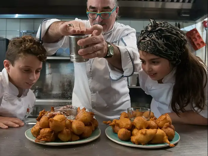 שאול בן אדרת מבשל עם הילדים (נמרוד סונדרס) שאול בן אדרת מבשל עם הילדים (נמרוד סונדרס)