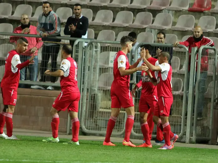 שחקני בני סכנין חוגגים (אדריאן הרבשטיין) שחקני בני סכנין חוגגים (אדריאן הרבשטיין)