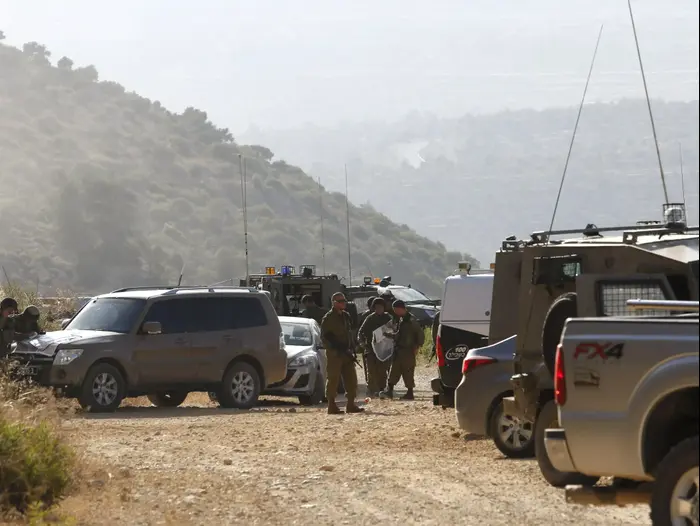 פיגוע ירי בסמוך להתנחלות דולב, 20 ביוני 2015 (AP) פיגוע ירי בסמוך להתנחלות דולב, 20 ביוני 2015 (AP)
