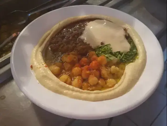חומוס בר קניון אם הדרך (צילום מסך , פייסבוק) חומוס בר קניון אם הדרך (צילום מסך , פייסבוק)
