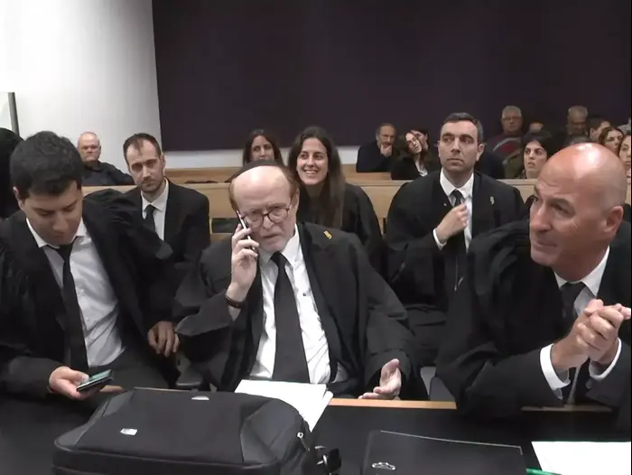משפטו של בנימין בן אליעזר החל שלא בנוכחותו: "כופרים בכתב האישום" (יותם רונן) משפטו של בנימין בן אליעזר החל שלא בנוכחותו: "כופרים בכתב האישום" (יותם רונן)