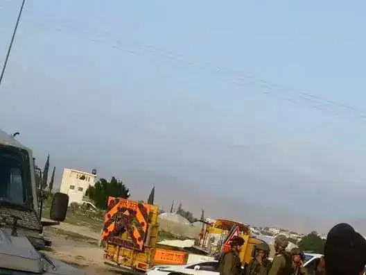 זירת הפיגוע בכפר עוג'ה, 3 במרץ 2016 (צילום מסך , טוויטר) זירת הפיגוע בכפר עוג'ה, 3 במרץ 2016 (צילום מסך , טוויטר)