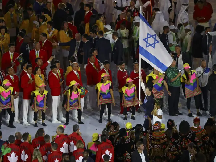 נטע ריבקין עם דגל ישראל במצעד המשלחות טקס הפתיחה של אולימפיאדת ריו (רויטרס) נטע ריבקין עם דגל ישראל במצעד המשלחות טקס הפתיחה של אולימפיאדת ריו (רויטרס)