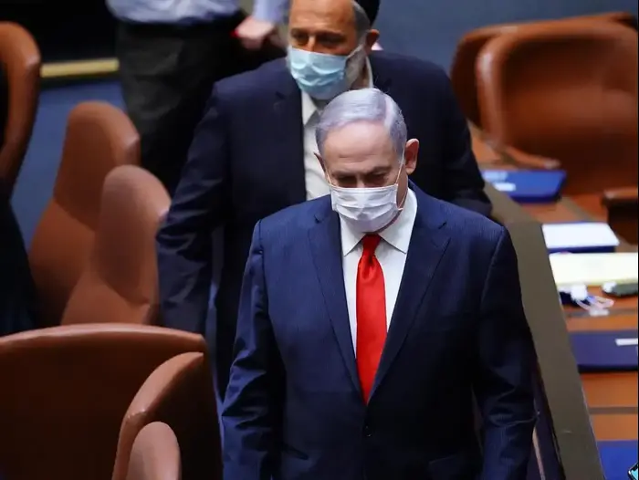 ראש הממשלה, בנימין נתניהו במהלך כינוס מליאת הכנסת 6 במאי 2020 (אתר רשמי , דוברות הכנסת - עדינה ולמן) ראש הממשלה, בנימין נתניהו במהלך כינוס מליאת הכנסת 6 במאי 2020 (אתר רשמי , דוברות הכנסת - עדינה ולמן)