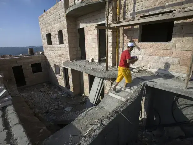 בנייה בהתנחלויות בגדה המערבית (יהודה ושומרון) (רויטרס) בנייה בהתנחלויות בגדה המערבית (יהודה ושומרון) (רויטרס)