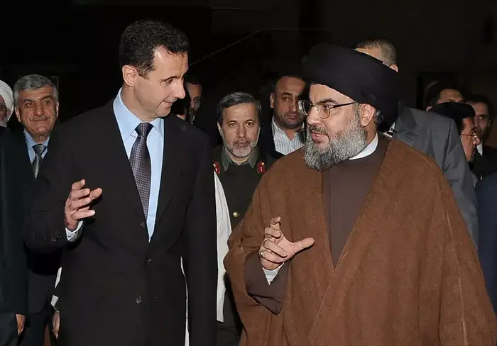 פגישה בין אסד לנסראללה ב-2010 (AP)