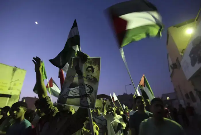 אירועי "יום קודס" בבחריין, אוגוסט 2013 (AP) אירועי "יום קודס" בבחריין, אוגוסט 2013 (AP)