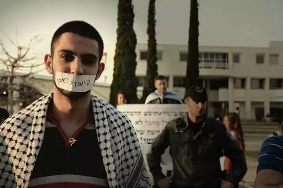 אחמד טאהא, חבר בתא חד"ש, בזמן ההפגנה נגד החלטת אוניברסיטת תל אביב (יח"צ , : עאידה קעדאן) אחמד טאהא, חבר בתא חד"ש, בזמן ההפגנה נגד החלטת אוניברסיטת תל אביב (יח"צ , : עאידה קעדאן)