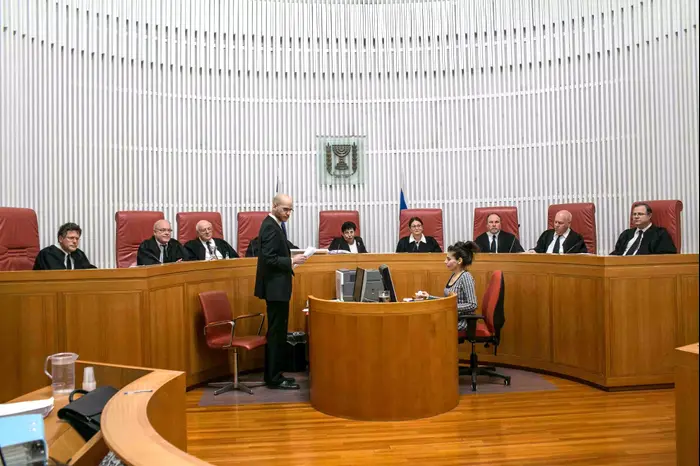 דיון בבית המשפט העליון לאישור החלטת ועדת הבחירות המרכזית לכנסת לפסול את מועמדותם של ח"כ חנין זועבי וברוך מרזל, פברואר 2015 (נועם מושקוביץ) דיון בבית המשפט העליון לאישור החלטת ועדת הבחירות המרכזית לכנסת לפסול את מועמדותם של ח"כ חנין זועבי וברוך מרזל, פברואר 2015 (נועם מושקוביץ)