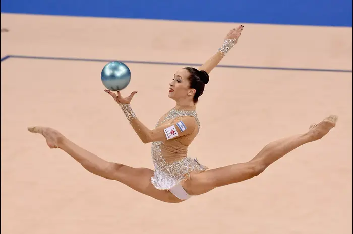 נטע ריבקין מתעמלת אומנותית ישראלית (GettyImages , Dennis Grombkowski) נטע ריבקין מתעמלת אומנותית ישראלית (GettyImages , Dennis Grombkowski)