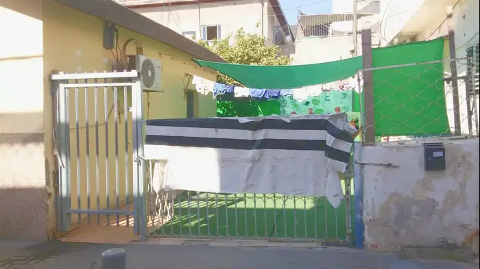 גן ילדים בשכונת התקווה בתל אביב שבו התגלה מקרה התעללות בפעוט, ספטמבר 2015 (יותם רונן) גן ילדים בשכונת התקווה בתל אביב שבו התגלה מקרה התעללות בפעוט, ספטמבר 2015 (יותם רונן)