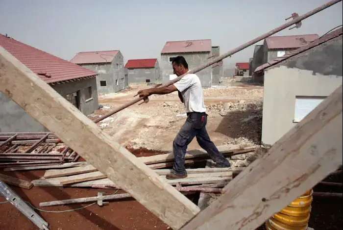 בנייה בהתנחלות בגדה המערבית (רויטרס) בנייה בהתנחלות בגדה המערבית (רויטרס)
