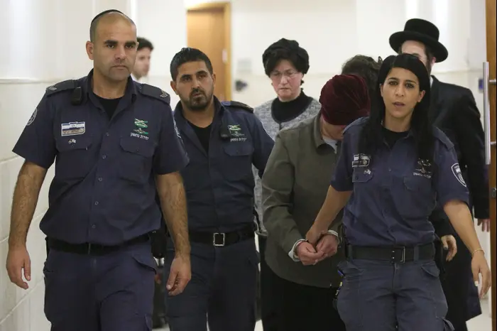 דיון בהארכת מעצרה של חשודה בעבירות מין בקטינות באוסטרליה שנעצרה בישראל, בית המשפט המחוזי בירושלים, פברואר 2018 (רויטרס) דיון בהארכת מעצרה של חשודה בעבירות מין בקטינות באוסטרליה שנעצרה בישראל, בית המשפט המחוזי בירושלים, פברואר 2018 (רויטרס)
