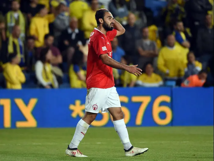 מיכאל אוחנה שחקן הפועל באר שבע (ברני ארדוב) מיכאל אוחנה שחקן הפועל באר שבע (ברני ארדוב)