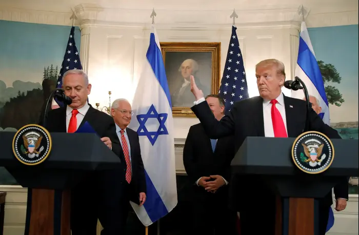 נשיא ארה"ב, דונלד טראמפ וראש הממשלה בנימין נתניהו רגע לפני פגישתם בבית הלבן 25 במרץ 2019 (רויטרס)