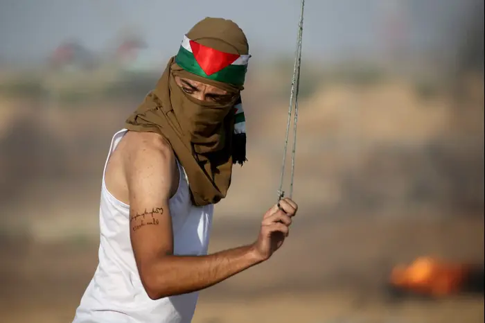 פלסטינים בעימותים בגבול רצועת עזה. 23 באוגוסט 2019 (רויטרס) פלסטינים בעימותים בגבול רצועת עזה. 23 באוגוסט 2019 (רויטרס)