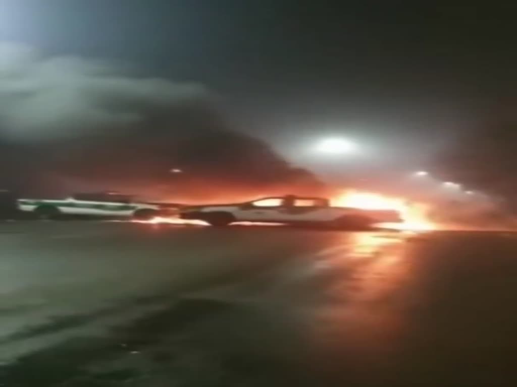 מחסום של הבסיג' באיראן עולה באש לאחר שהותקף