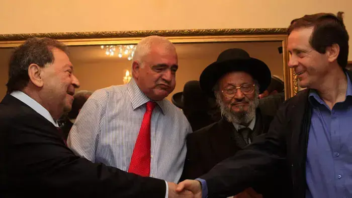 יצחק בוז'י הרצוג, בנימין בן אליעזר