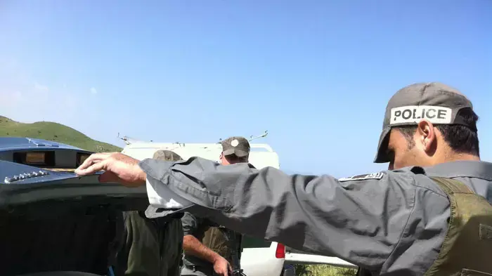 יום אחרי המהומות בגבול הסורי, מחסום סמוך ליישוב מג'דל שמס ברמת הגולן, מאי 2011