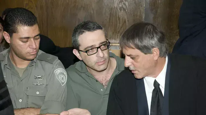 עו"ד גור פינקלשטיין, מואשם בהנחת מטען חבלה, הצתה ורצח בן זוגה של גרושתו, מאי 2011