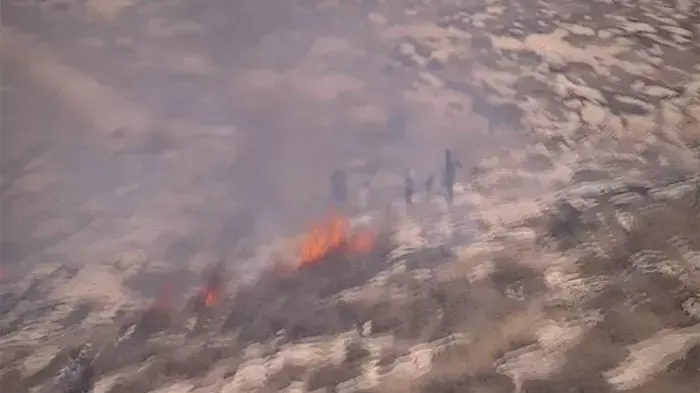 מתנחלים: פלסטינים מציתים שדות סמוך ליישוב