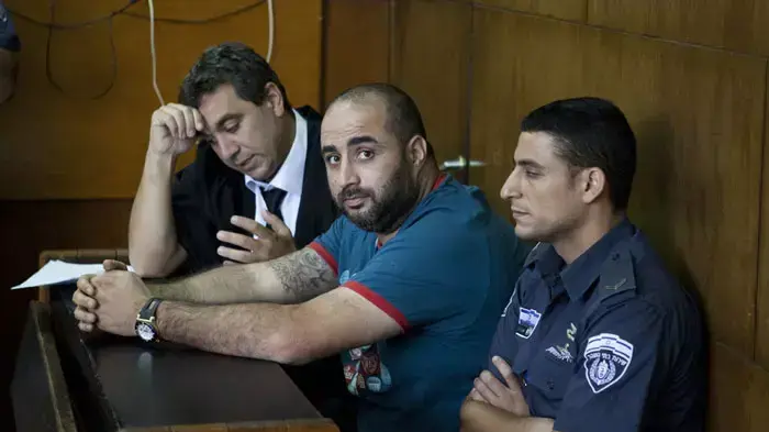 העבריים מיכאל חזן בהגשת כתב אישום נגד מרגלית נצעני, אוגוסט 2011 העבריים מיכאל חזן בהגשת כתב אישום נגד מרגלית נצעני, אוגוסט 2011