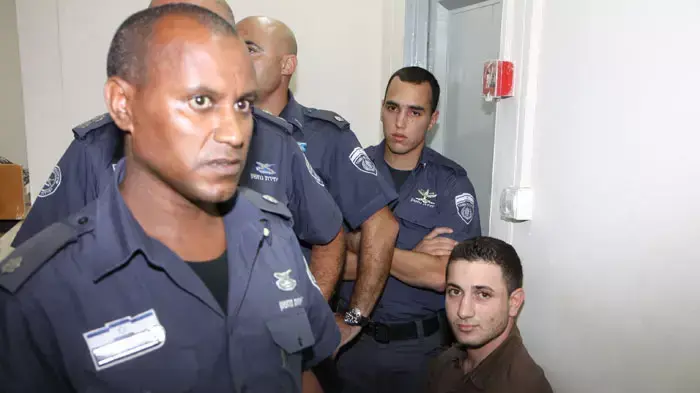 הנאשם ברצח משפחת פוגל, אמג'ד עוואד, בבית המשפט היום, אוקטובר 2011 הנאשם ברצח משפחת פוגל, אמג'ד עוואד, בבית המשפט היום, אוקטובר 2011