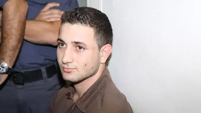 הנאשם ברצח משפחת פוגל, אמג'ד עוואד, בבית המשפט היום, אוקטובר 2011 הנאשם ברצח משפחת פוגל, אמג'ד עוואד, בבית המשפט היום, אוקטובר 2011