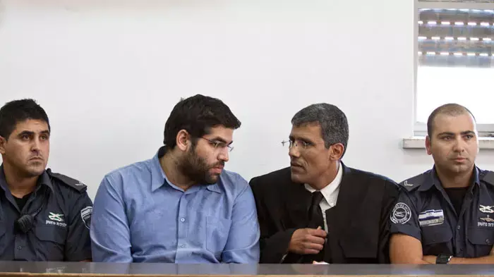 הקראת כתב האישום נגד דניאל מעוז, הנאשם ברצח הוריו, אוקטובר 2011