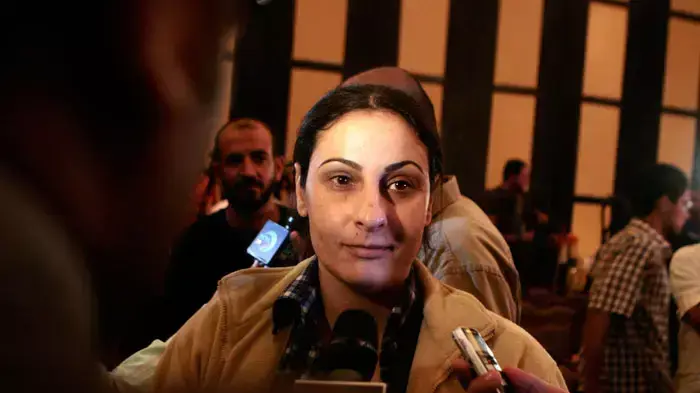 אמנה מונא מגיעה לטורקיה לאחר שחרורה מהכלא הישראלי , אוקטובר 2011 אמנה מונא מגיעה לטורקיה לאחר שחרורה מהכלא הישראלי , אוקטובר 2011
