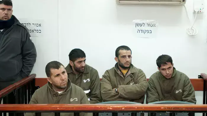 רוצחי אשר פלמר ובנו בבית משפט, נובמבר 2011