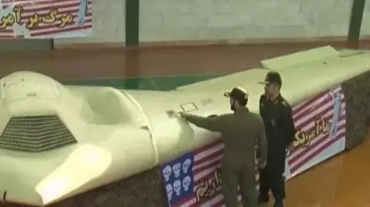 הטלוויזיה האיראנית מציגה תמונות של המל"ט האמריקאי, דצמבר הטלוויזיה האיראנית מציגה תמונות של המל"ט האמריקאי, דצמבר