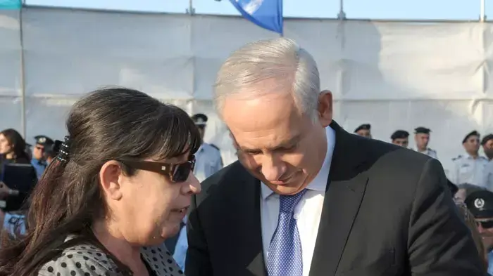 אמו של אלעד ריבן, בטקס ציון שנה לאסון הכרמל, דצמבר 2011