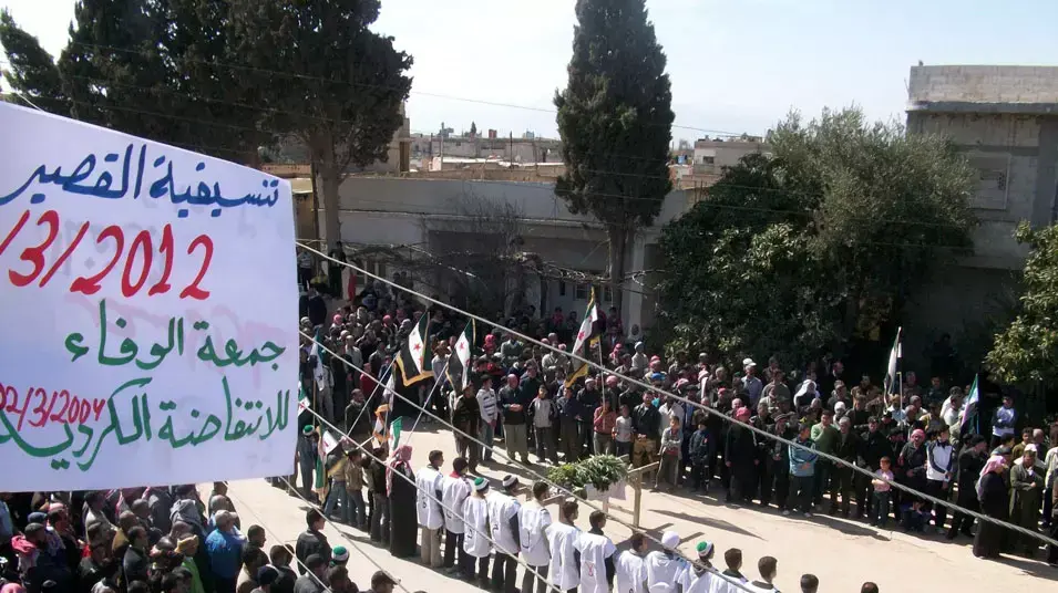 הפגנה נגד שלטון אסד בעיירה קוסייר שבמחוז חומס, 9 במרץ 2012 הפגנה נגד שלטון אסד בעיירה קוסייר שבמחוז חומס, 9 במרץ 2012