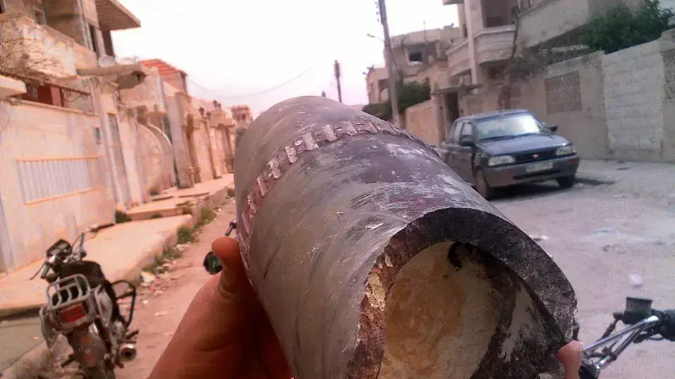 הרס ברחובות העיירה אל-קסיר שבמחוז חומס, בעקבות הפגזת צבא סוריה, מרץ 2012 הרס ברחובות העיירה אל-קסיר שבמחוז חומס, בעקבות הפגזת צבא סוריה, מרץ 2012