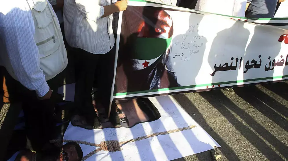הפגנה נגד נשיא סוריה בשאר אסד מחוץ לשגרירות סוריה בבירת ירדן, עמאן, 30 במאי 2012 הפגנה נגד נשיא סוריה בשאר אסד מחוץ לשגרירות סוריה בבירת ירדן, עמאן, 30 במאי 2012