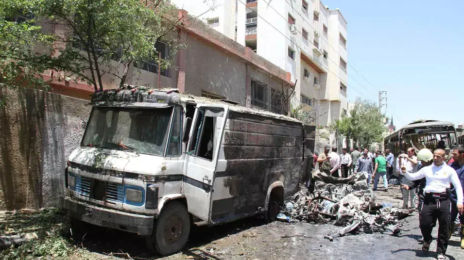 זירת פיגוע תופת בפרבר קודסייה של בירת סוריה, דמשק, 8 ביוני 2012 זירת פיגוע תופת בפרבר קודסייה של בירת סוריה, דמשק, 8 ביוני 2012
