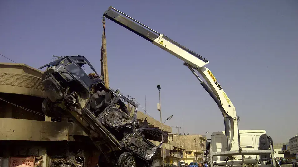 זירת פיצוץ מכונית תופת נגד מאמינים שיעים, בגדד, עירק, 13 ביוני 2012 זירת פיצוץ מכונית תופת נגד מאמינים שיעים, בגדד, עירק, 13 ביוני 2012