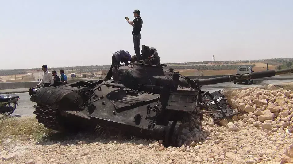 לוחמים של מחתרת "הצבא הסורי החופשי" ליד העיר אידליב, צפון סוריה, יוני 2012 לוחמים של מחתרת "הצבא הסורי החופשי" ליד העיר אידליב, צפון סוריה, יוני 2012